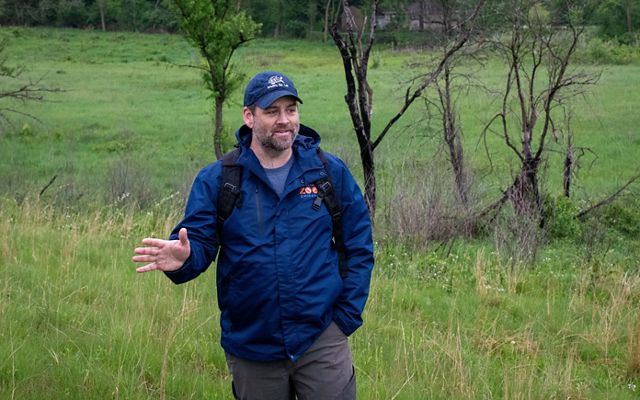 A photo of Matt Allender talking.
